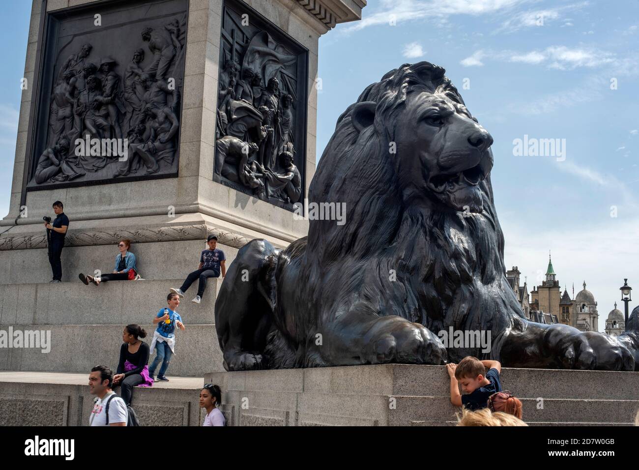 Lion sculptures at the base of Nelson's Column on Trafalgar Square in London, U.K. Stock Photo