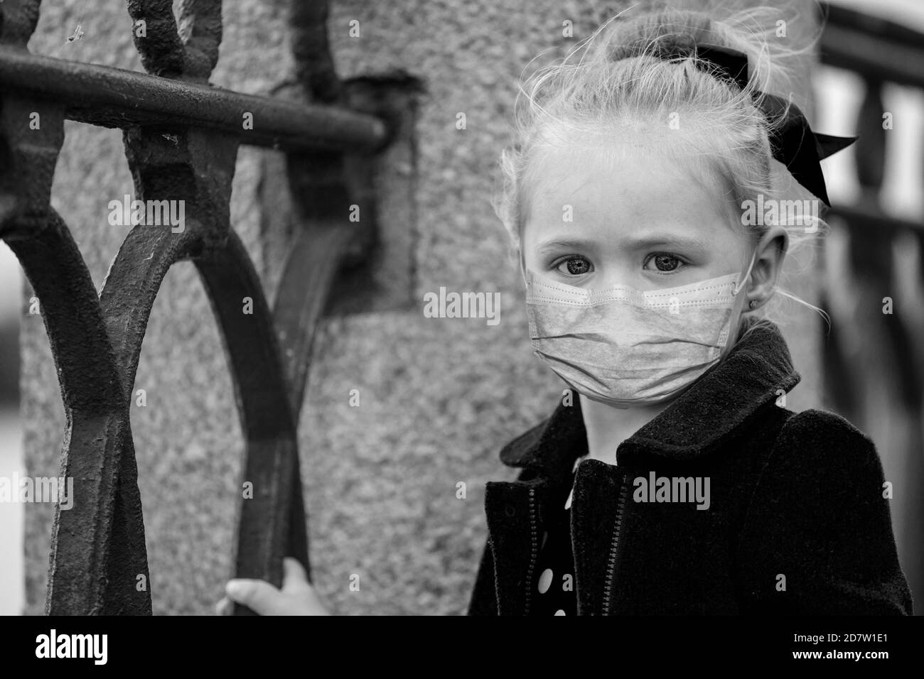 Little girl with mask Black and White Stock Photos & Images - Alamy
