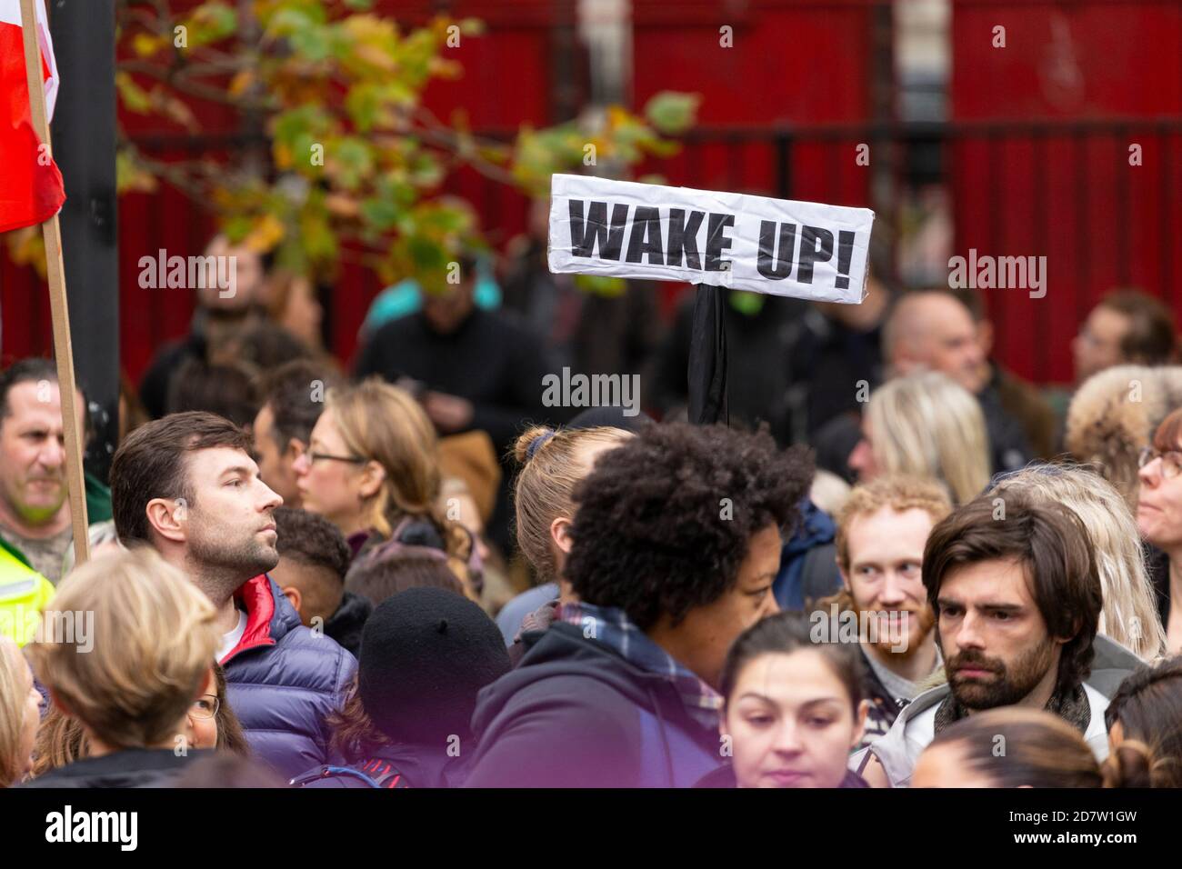 Protest sign held above a crowd during an anti-lockdown rally in London, 24 October 2020 Stock Photo