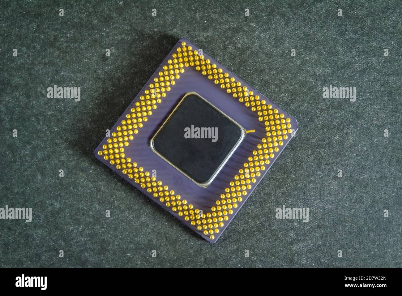 Main processor of desktop computer close-up isolated on a dark grey background. Stock Photo