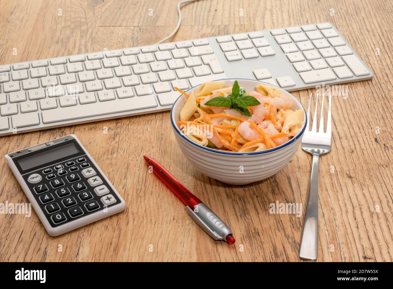 Working lunch at the office desk - dieting concept Stock Photo