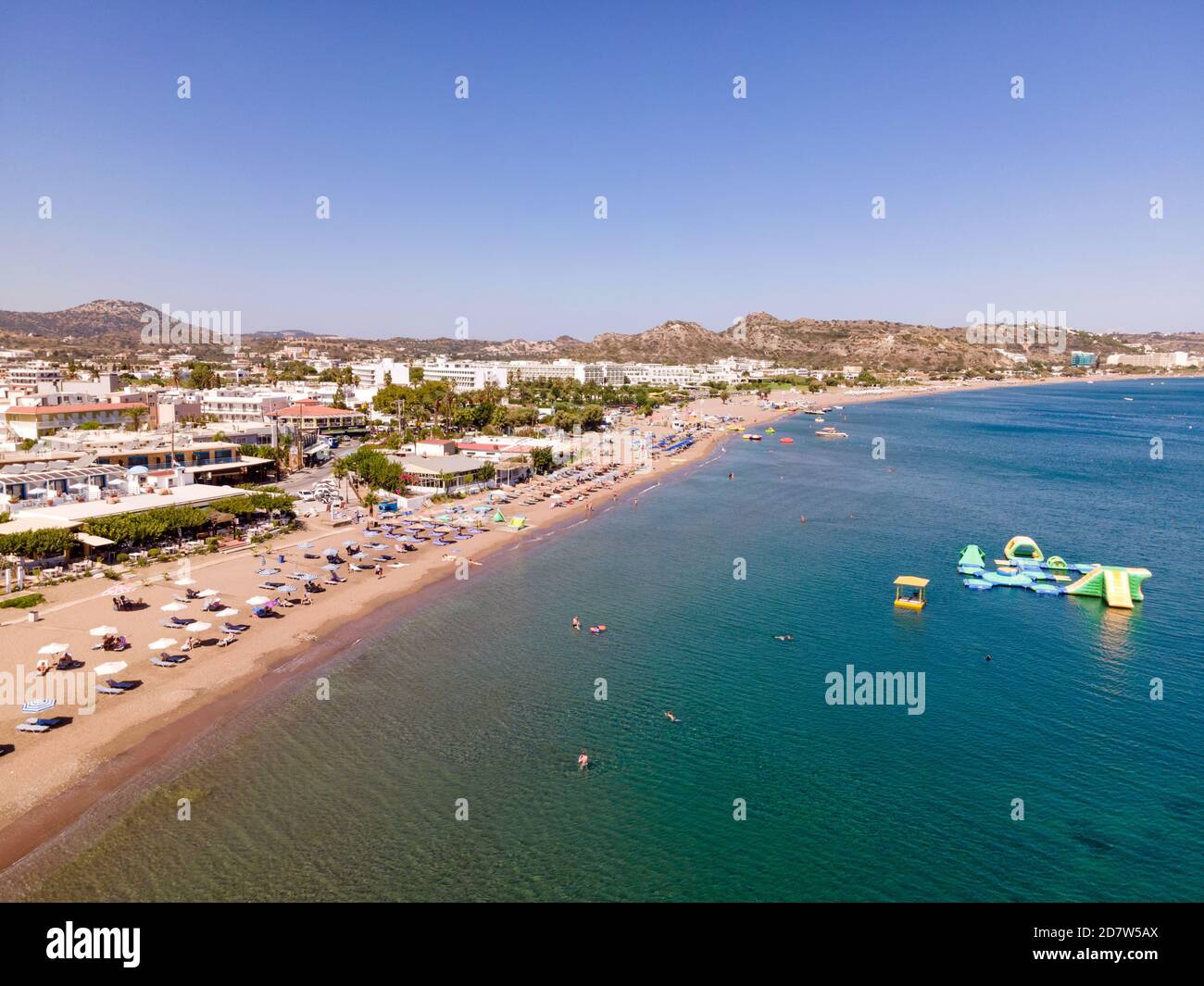 The sandy beach in Faliraki, Rhodes, Greece Stock Photo