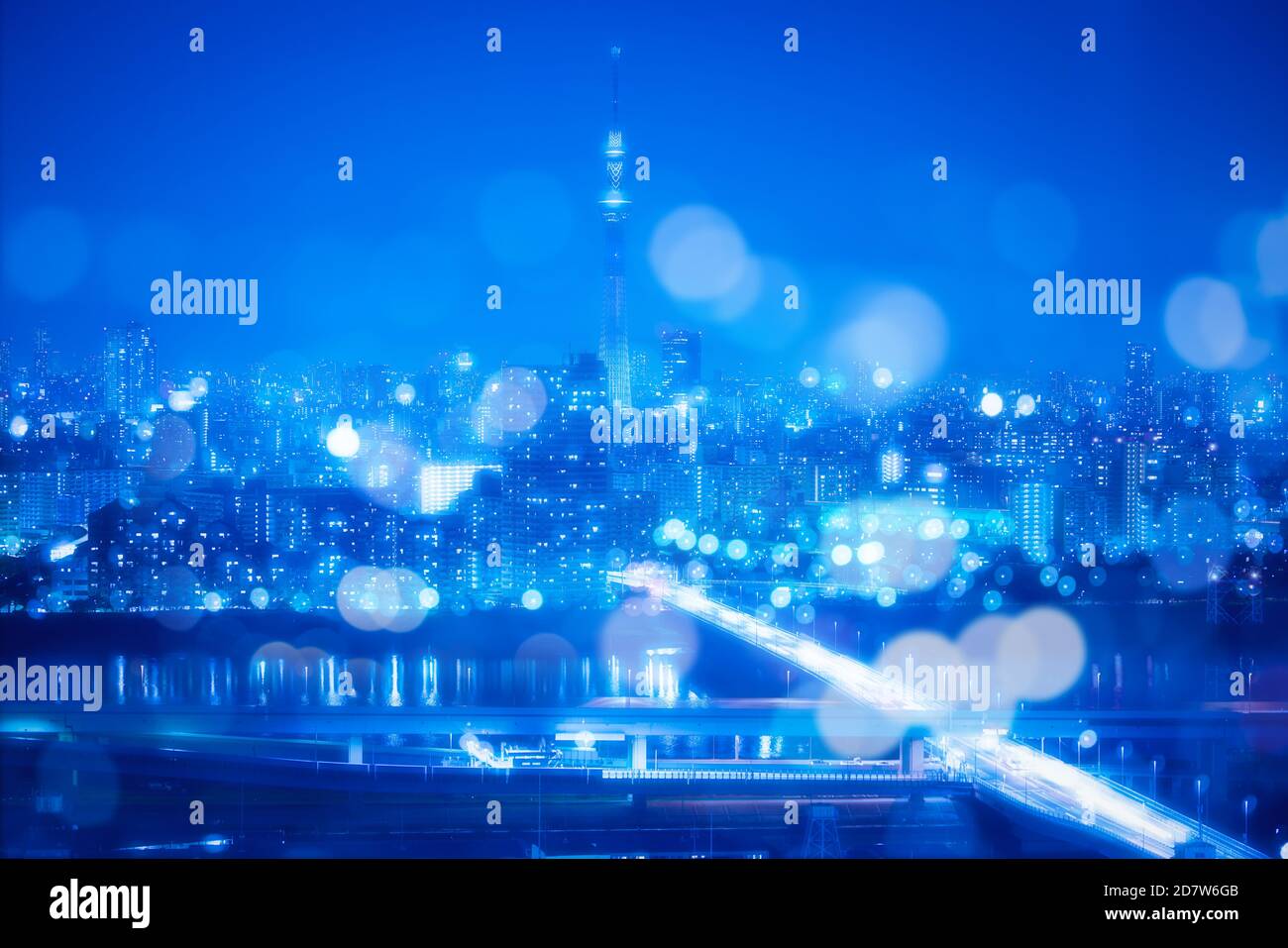 Nightlife Background in Tokyo. Tokyo Skyline with Blur Bokeh Lights Decoration in Colorful Filter. Tokyo Sky Tree Cityscape Background. Night sky and Stock Photo