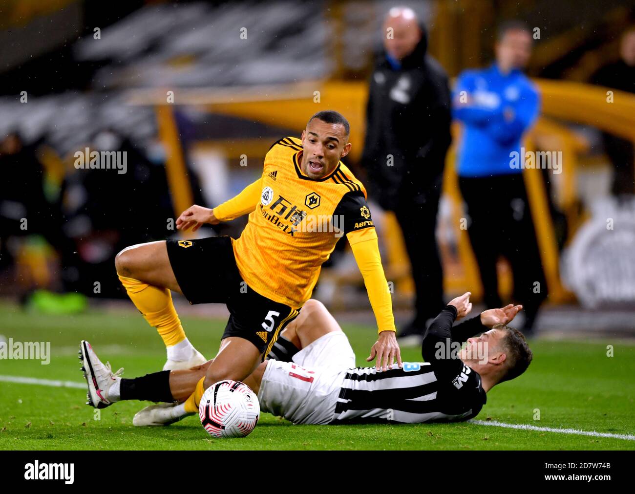 Wolverhampton Wanderers' Marcal (left) and Newcastle United's Ryan Fraser clash into each other during the Premier League match at Molineux, Wolverhampton. Stock Photo