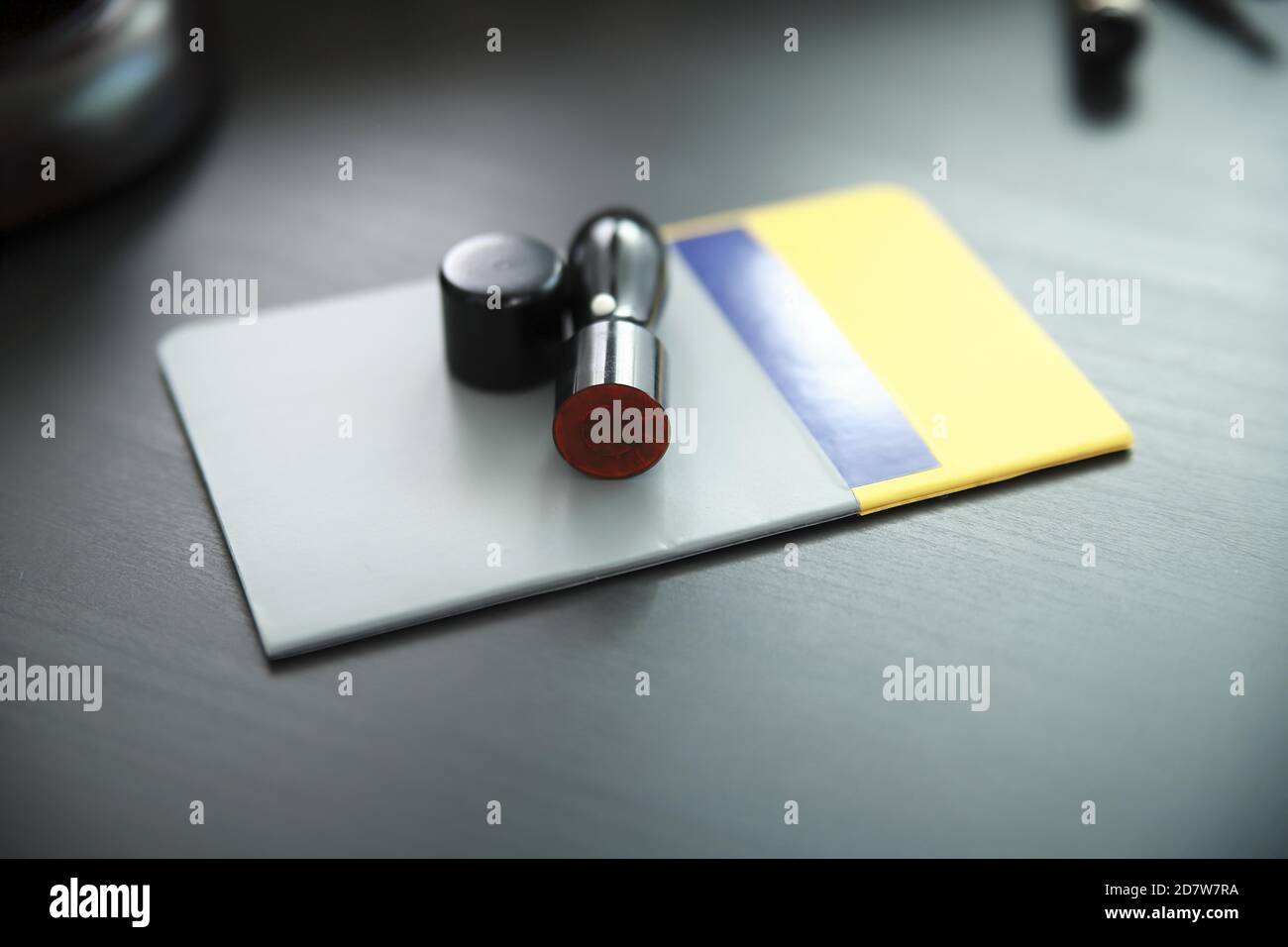 Bank book with stamp on desk Stock Photo
