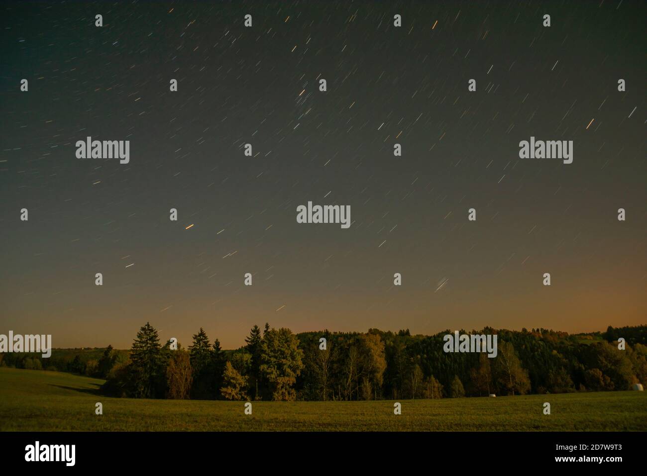 Dark Blue Sky With Stars And Moonshine On Pasture Land And Field Near Utery Town In Czech Republic Stock Photo Alamy
