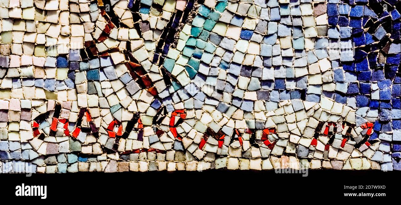 This is a close-up of the mosaic signature of Marc Chagall at the bottom of 'The Four Seasons,' one of the French artist's most monumental works of outdoor public art that was installed in 1974 in Chicago, Illinois, USA. The artwork is inlaid with thousands of colorful stone and glass chips in more than 250 colors. This is a very small section of Chagall's remarkable creation that wraps around four sides of a rectangular box that is 14 feet (4.3 meters) high and has a circumference of 160 feet (49 meters). Stock Photo