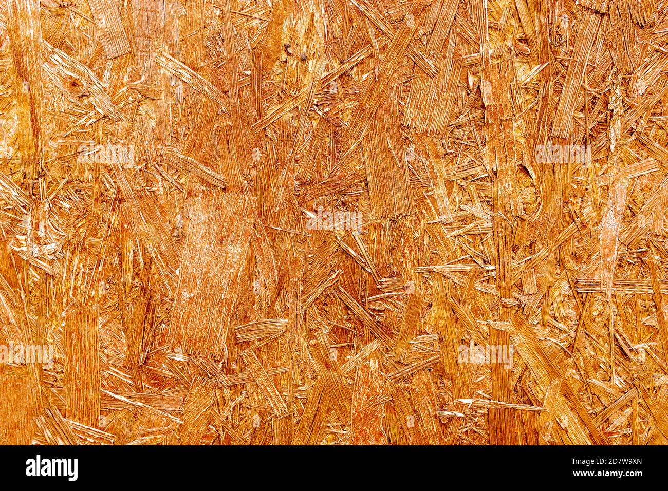 pressed wooden panel background, seamless texture of oriented strand board - OSB wood Stock Photo