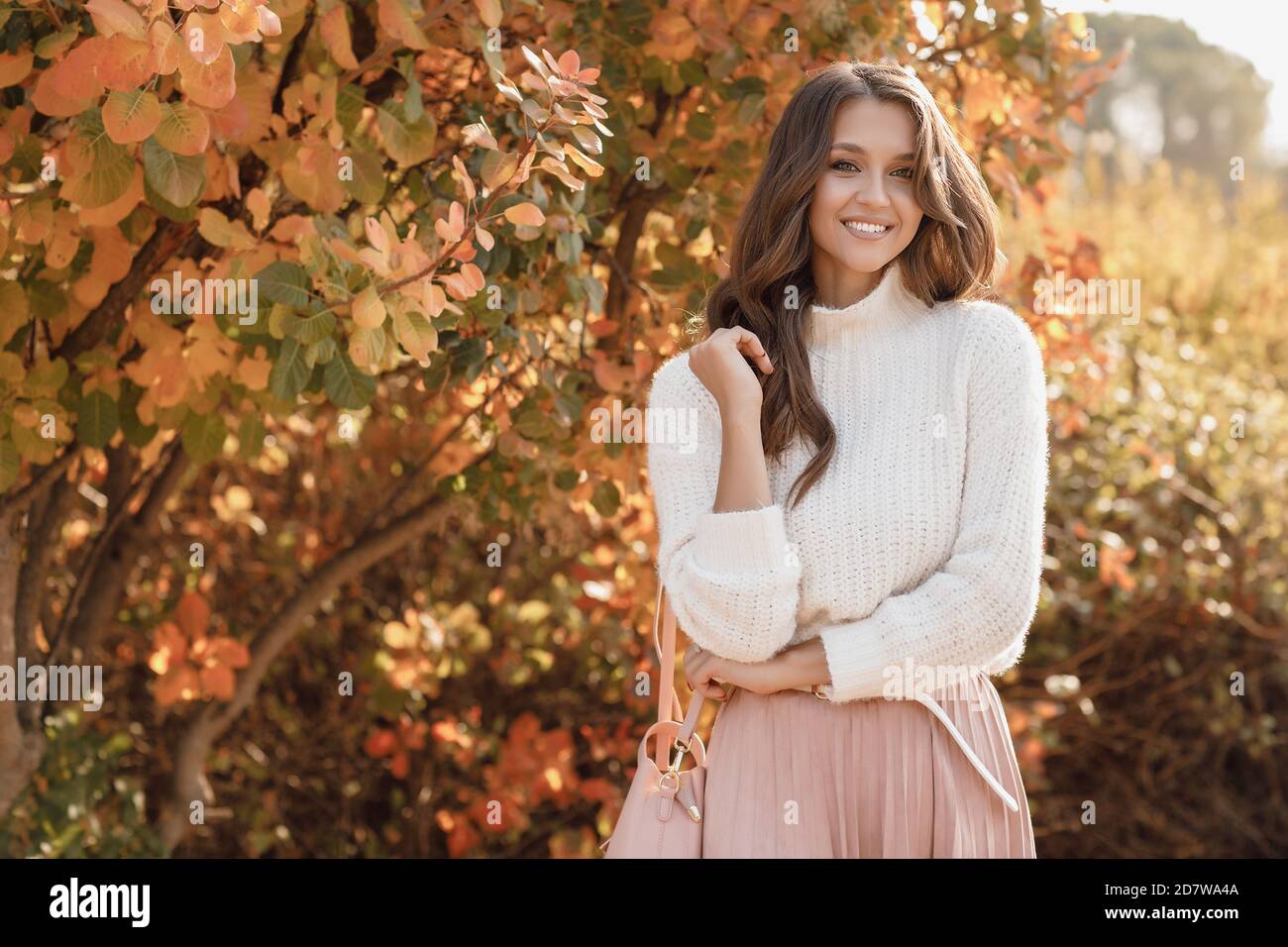 autumn portrait of a happy young woman outdoor Stock Photo - Alamy