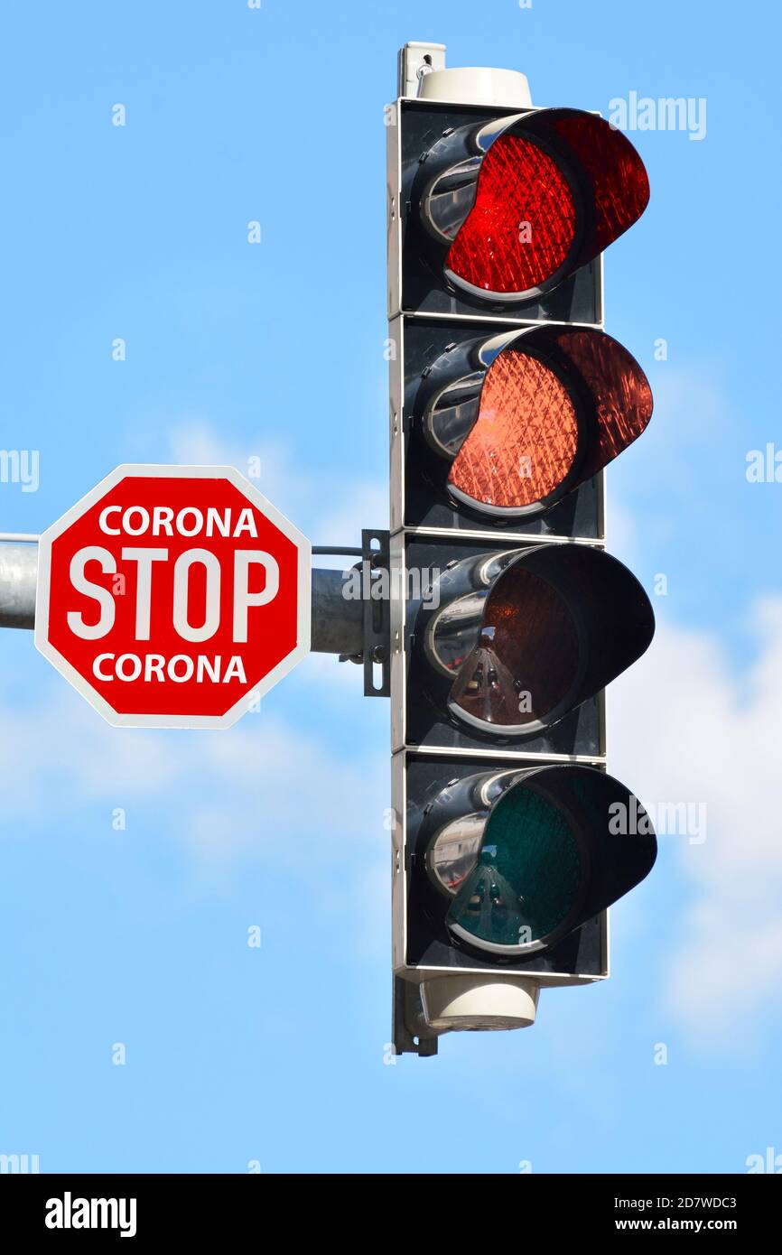 Corona traffic light switching for red to dangerous dark red Stock Photo