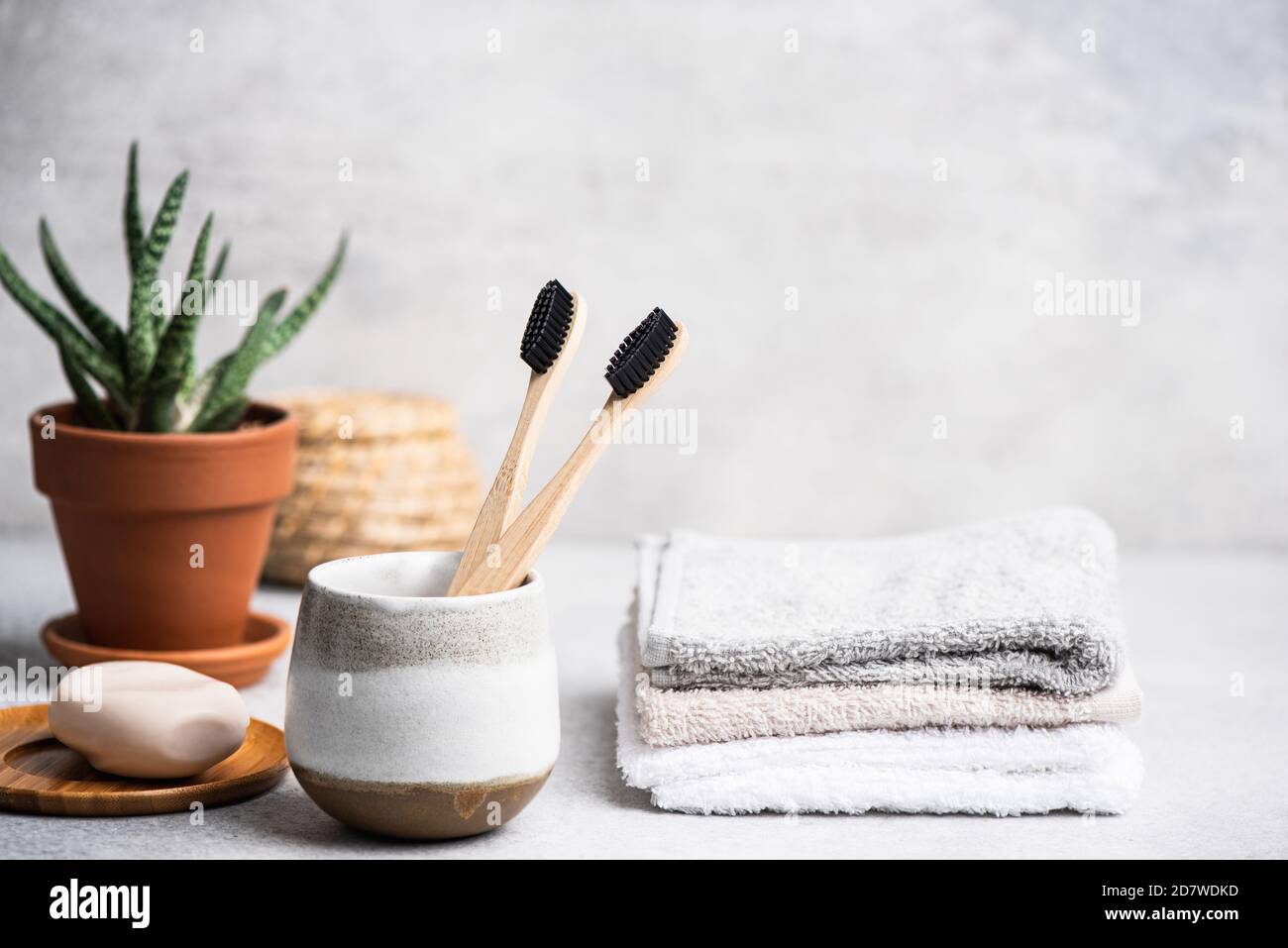 Charcoal toothbrush in bathroom. Eco sustainable lifestyle, health care, zero waste concept Stock Photo