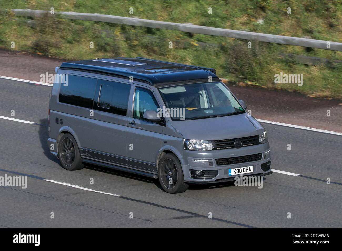 2015 Volkswagen Transporter T28 Startline; moving ehicle driving on the M61 motorway near Manchester, UK Stock Photo