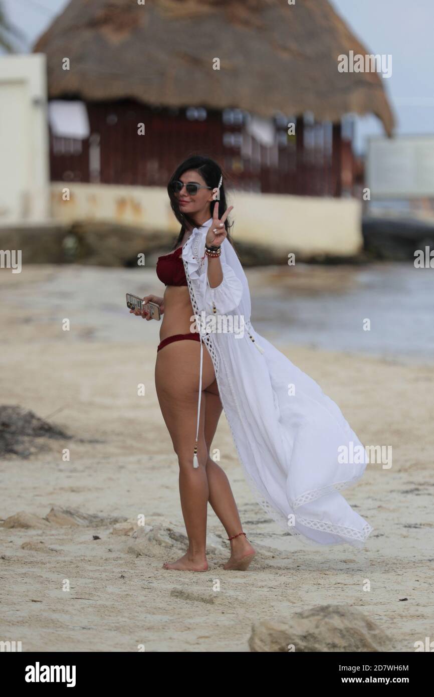 Cancun, Mexico. 24th Oct, 2020. CANCUN, MEXICO - OCTOBER 24: Mexican  actress Vanessa Arias, wearing an attractive red bikini, she takes a break  to enjoy their holidays on the beach amid Covid-19