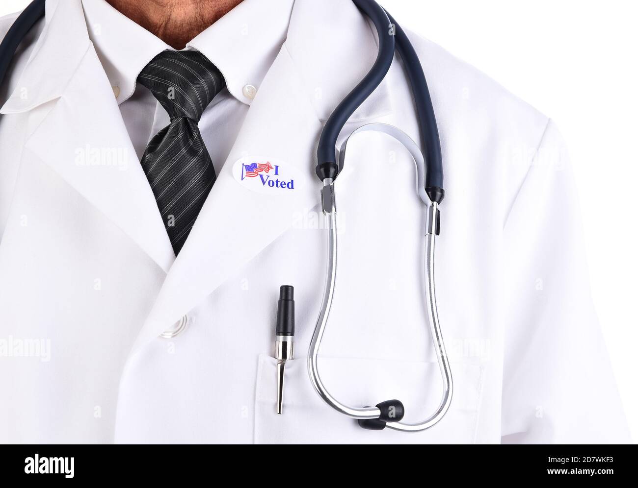 Closeup of a doctor with an I Voted sticker on the lapel of his white Lab Coat. Stock Photo