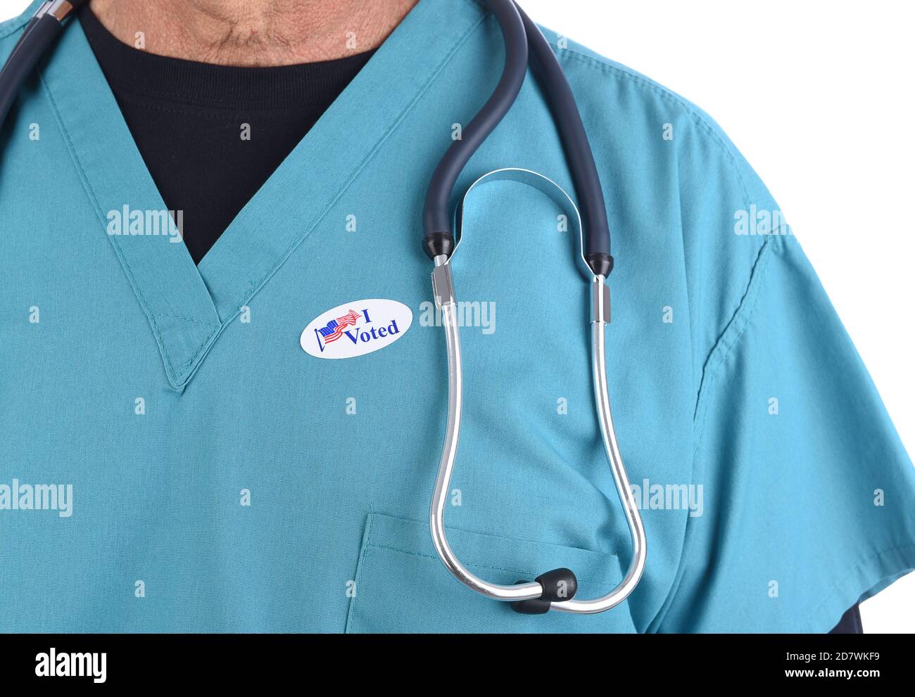 Closeup of a doctor with an I Voted sticker on his surgical scrubs. Stock Photo