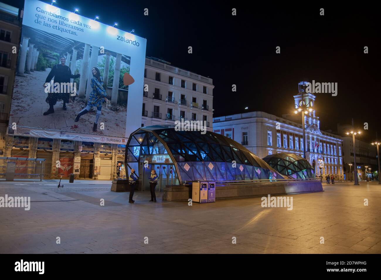 Madrid was transformed with the lowering of the hospitality blinds into  empty streets, lights off, midnight began a curfew leaving an empty city in  th Stock Photo - Alamy