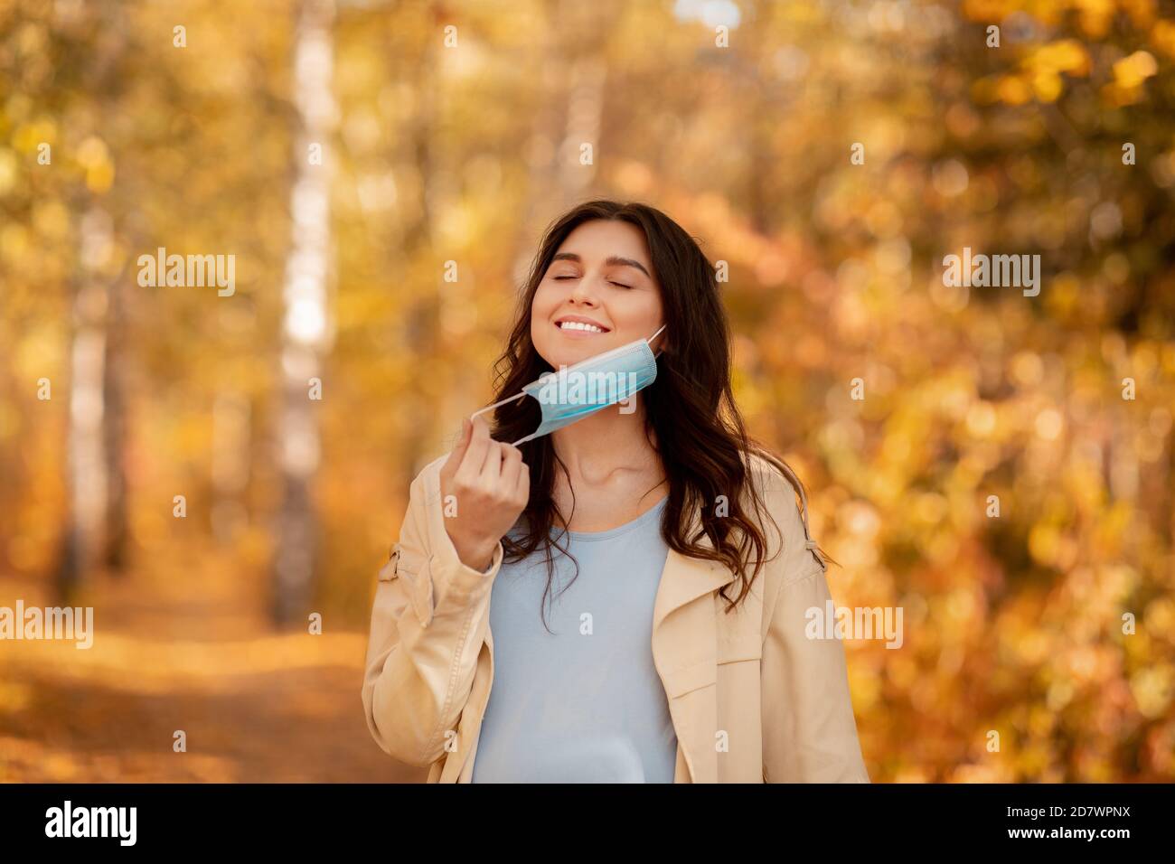 Removing mask hi-res stock photography and images - Alamy