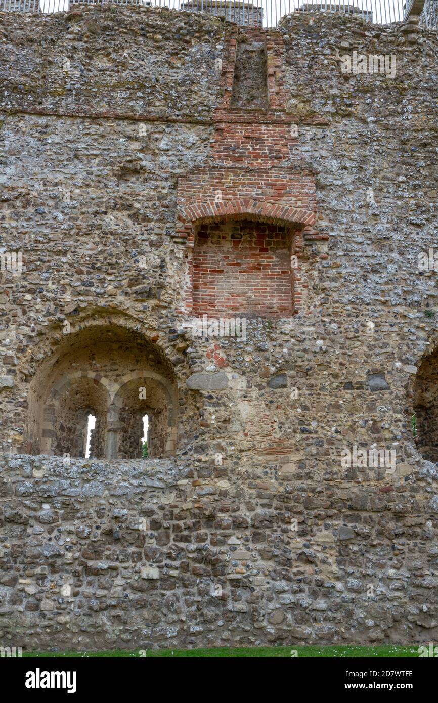 Interior walls of Framlingham Castle, Suffolk, UK showing the remains of a fireplace, flue/chimney and windows. Stock Photo