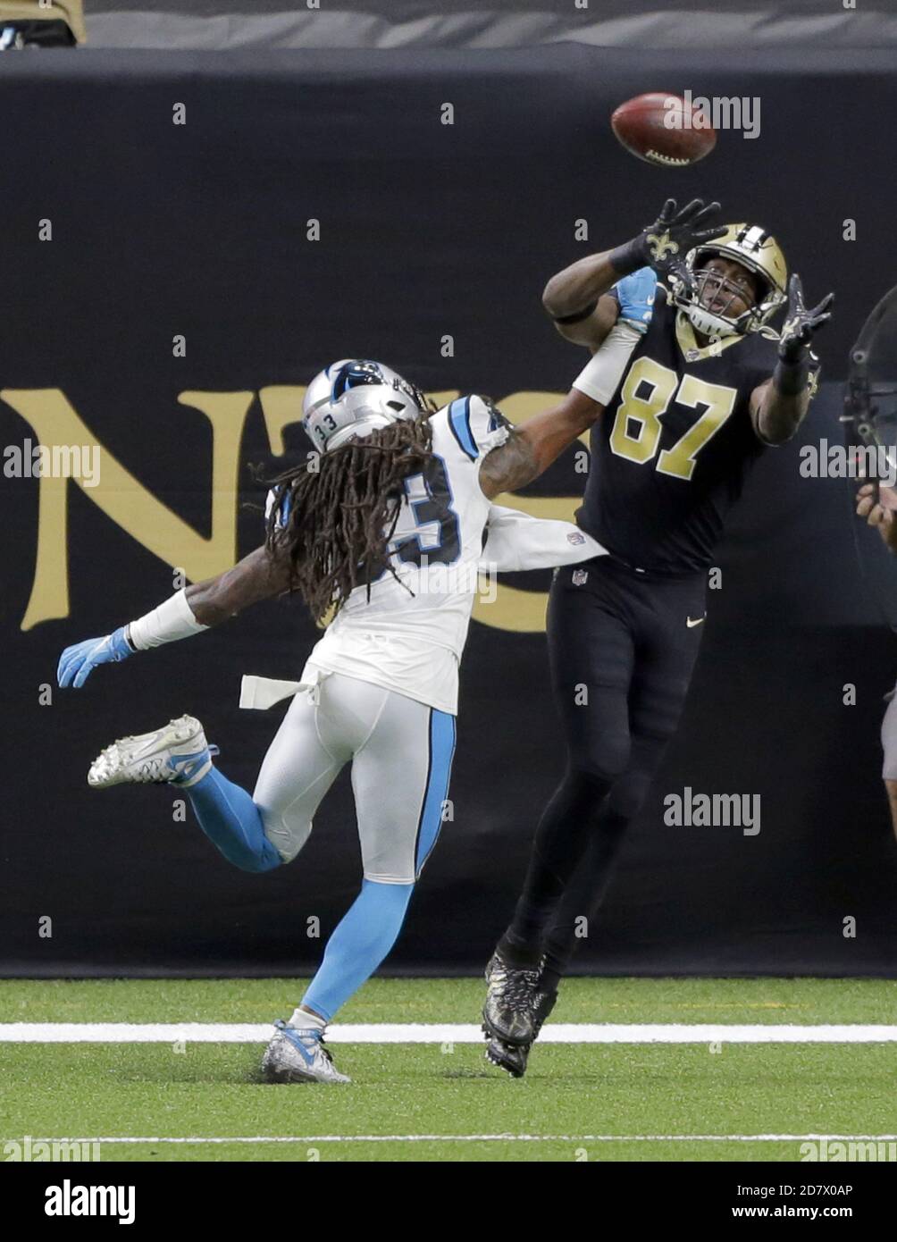 New Orleans, United States. 25th Oct, 2020. New Orleans Saints tight end Jared Cook (87) catches a touchdown pass as Carolina Panthers free safety Tre Boston (33) defends at the Louisiana Superdome in New Orleans on Monday, October 25, 2020. Photo by AJ Sisco/UPI. Credit: UPI/Alamy Live News Stock Photo