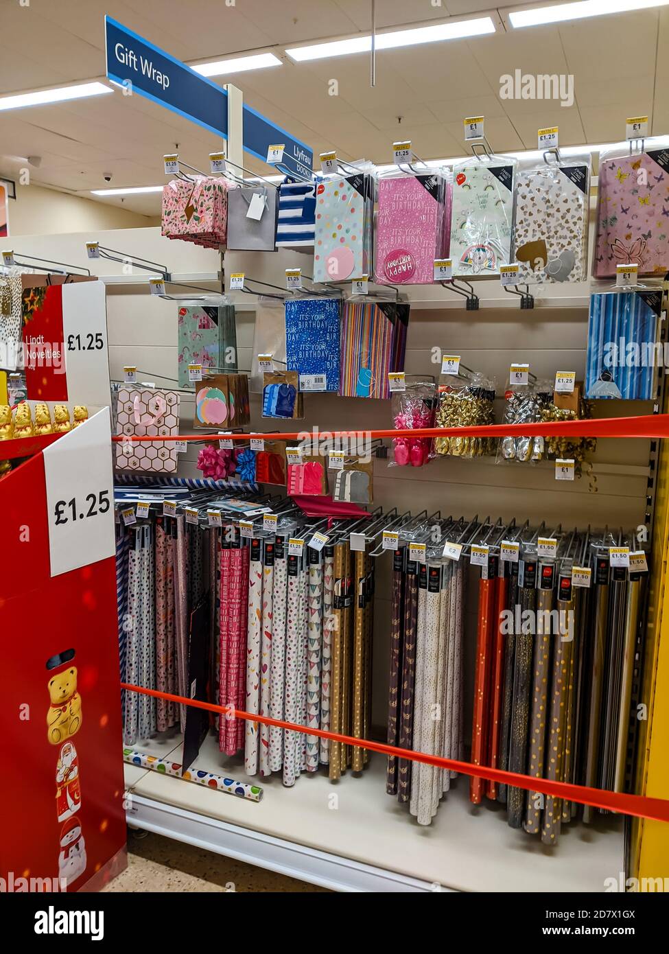 Tape closing off nonessential shopping items in a major supermarket in