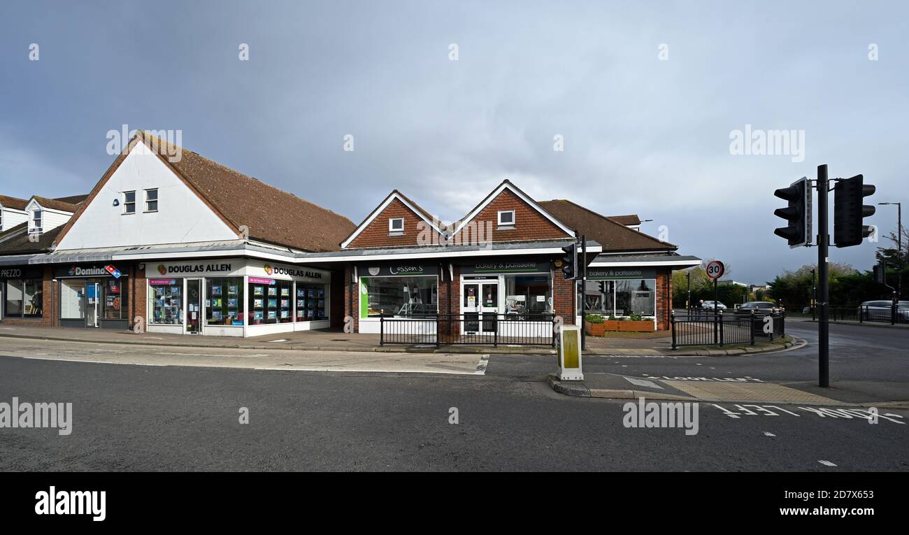 Buildings opposite Halls Corner at the south end of Wickford High Street. Domino's, Douglas Allen Cosson's. Stock Photo