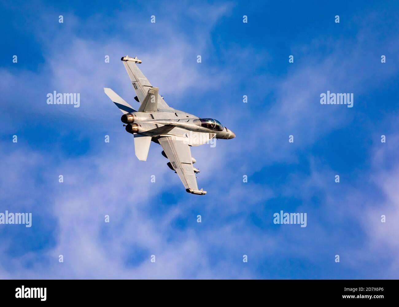 In this shot Boeing EA-18G Growler #501 makes a banking turn after taking off from Hill Air Force Base in Layton, Davis County, Utah, USA.  T Stock Photo