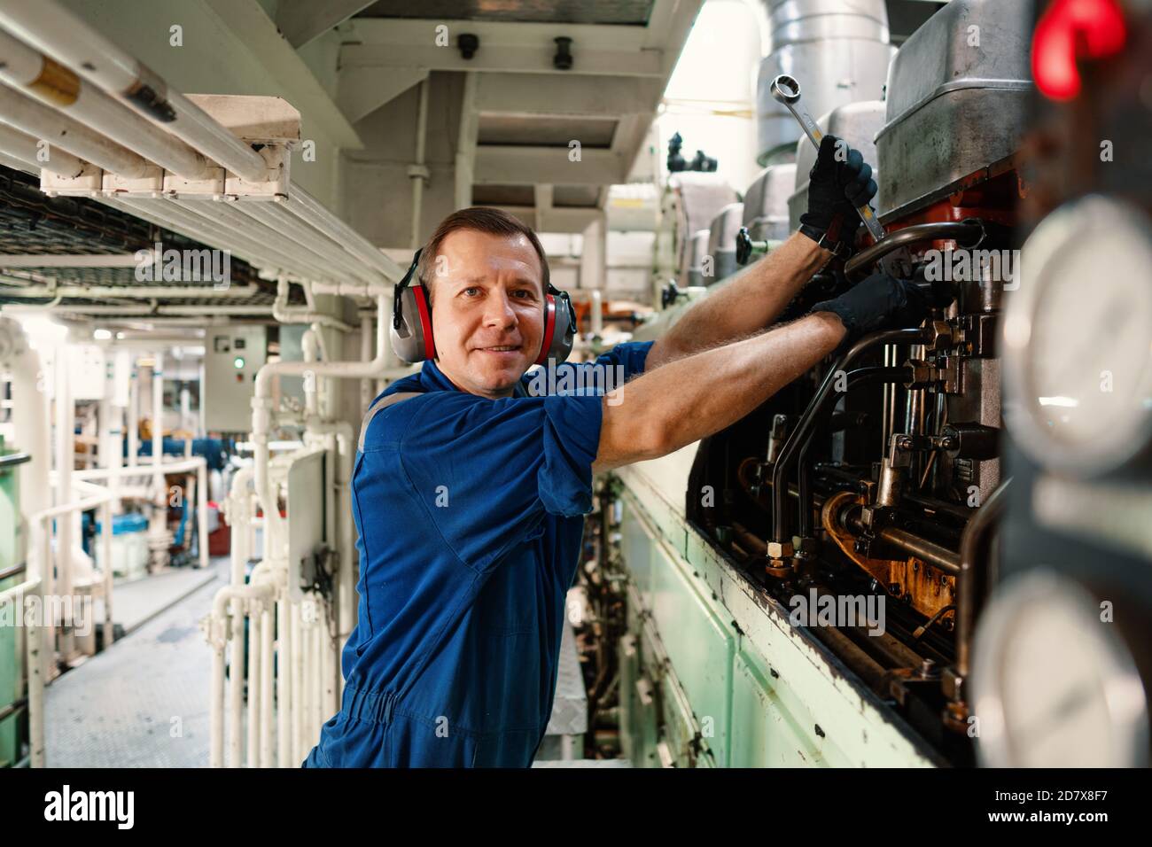 Marine engineer officer controlling vessel enginesand propulsion in ...