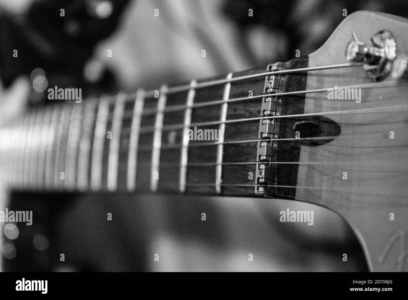 looking down electric guitar neck and strings Stock Photo