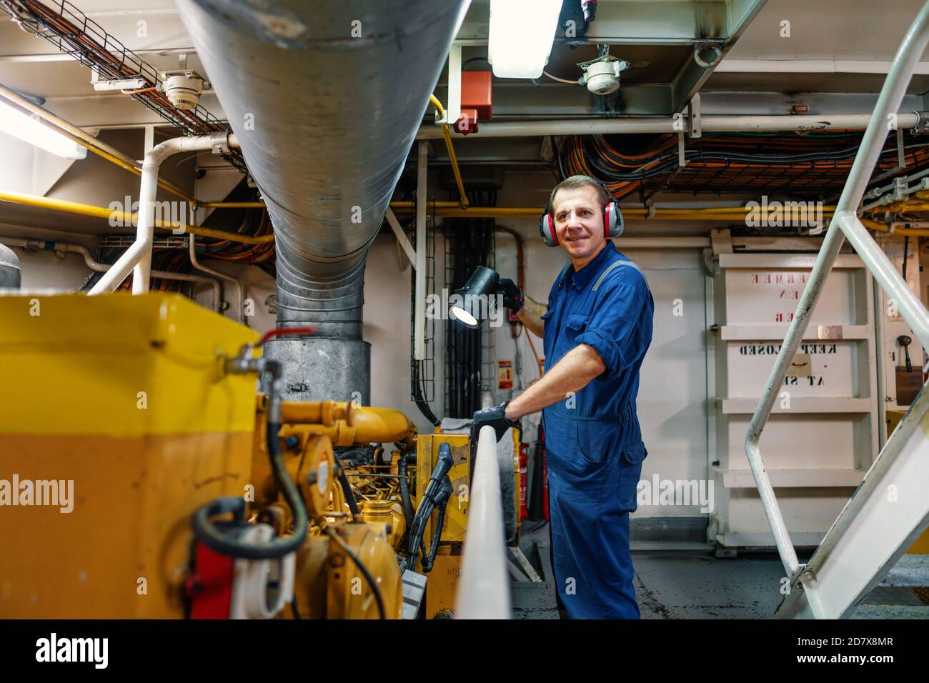 Marine engineer officer controlling vessel enginesand propulsion in ...