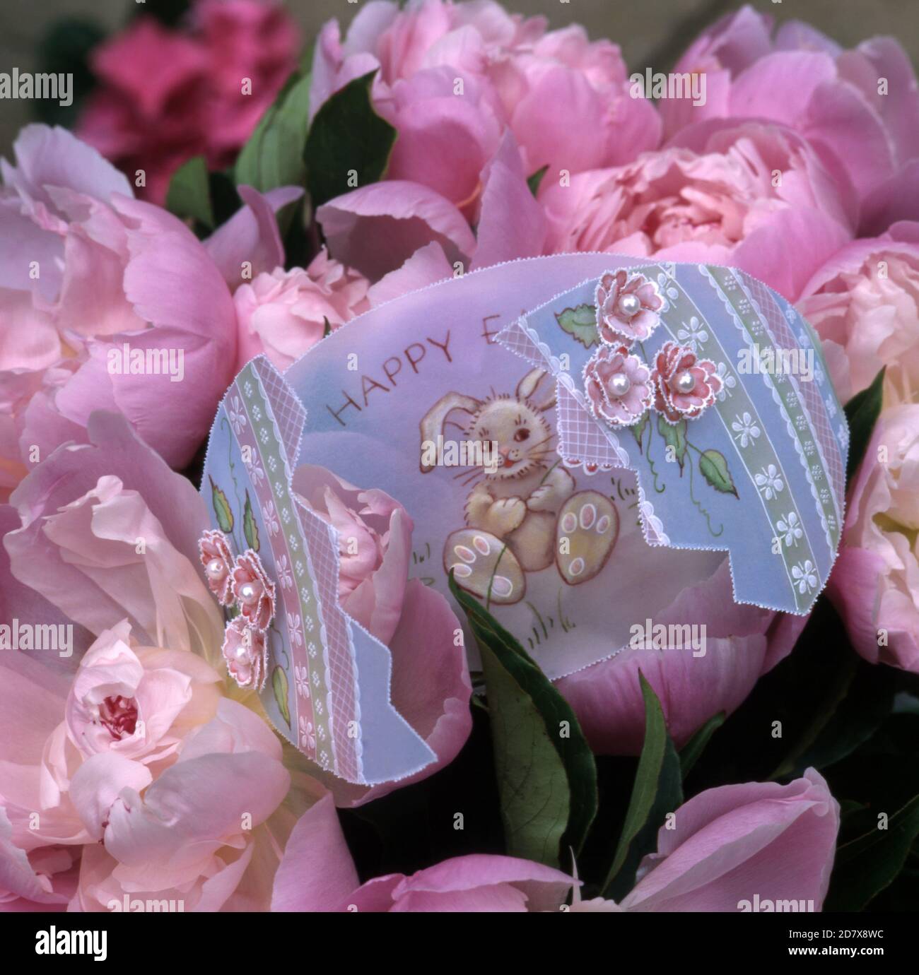 HAND PAINTED EASTER EGG SET AMONGST PINK FLOWERS Stock Photo - Alamy