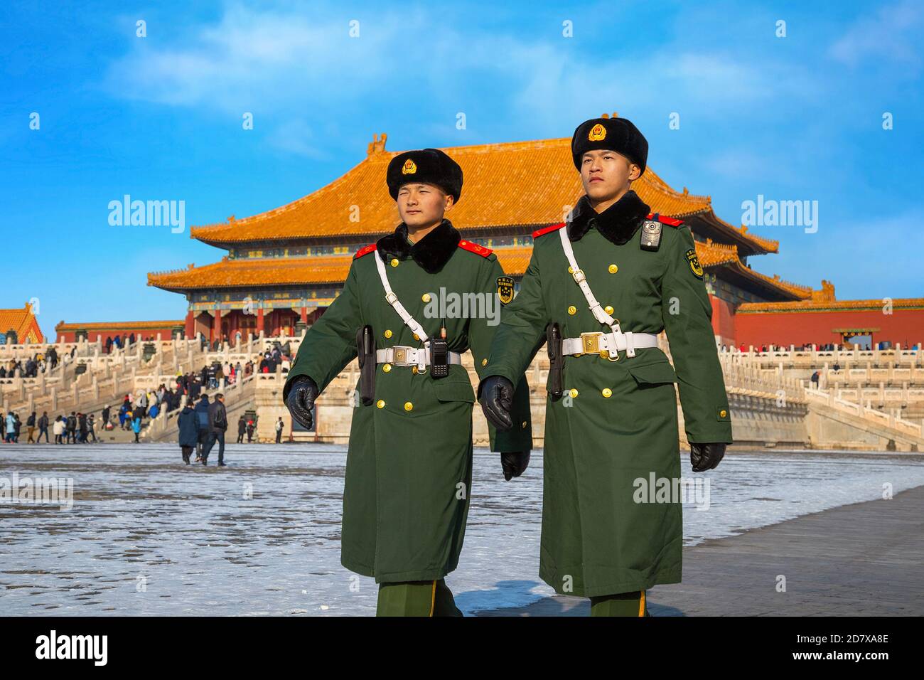 Beijing, China - Jan 9 2020: Unidentified Chinese military guards patrol on the courtyard of Taihedian (Hall of Supreme Harmony) in the Forbidden City Stock Photo