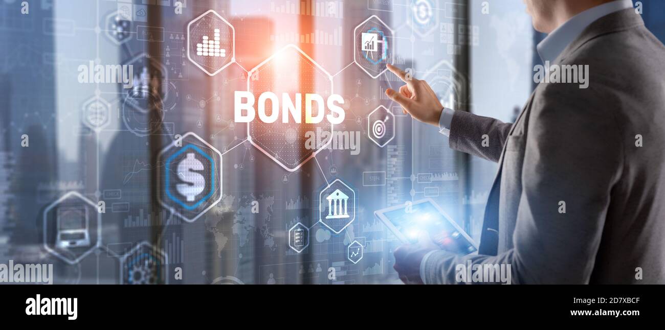 Businessman clicks inscription bonds. Bond Finance Banking Technology concept. Stock Photo