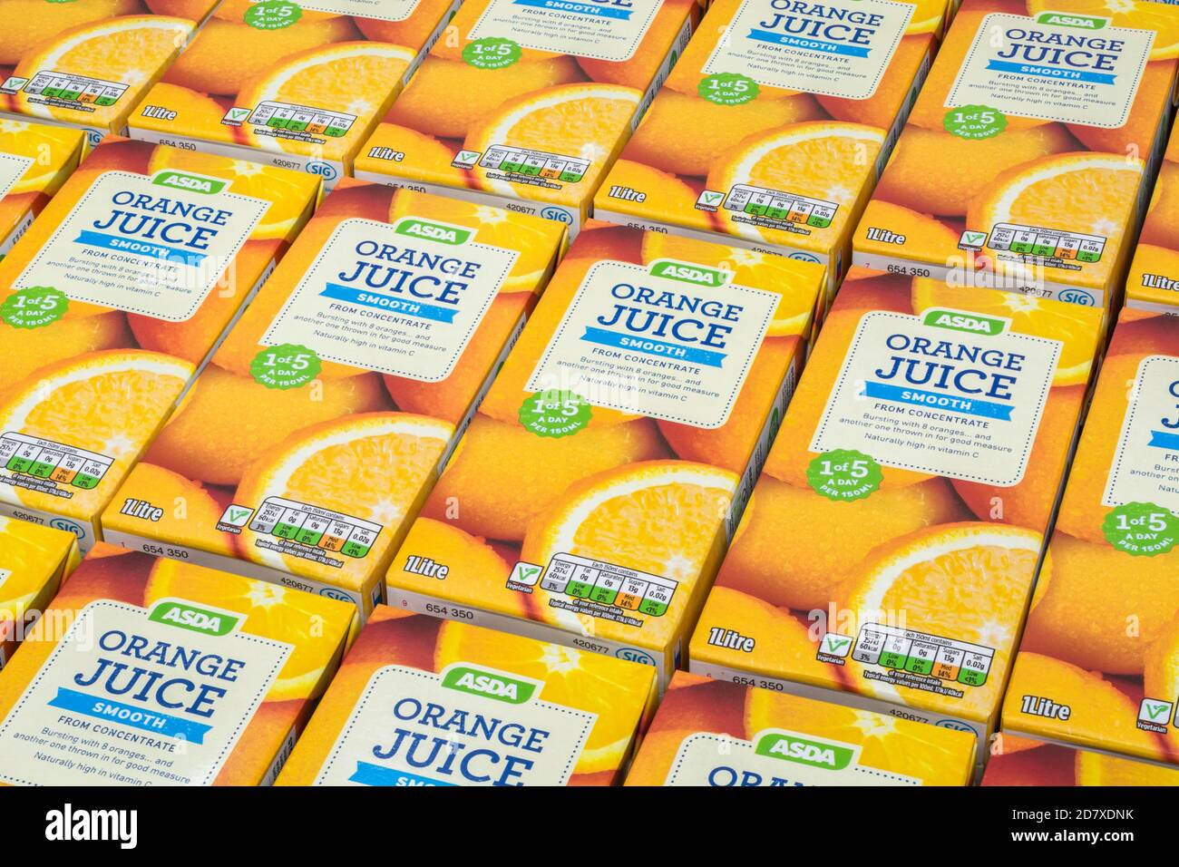 https://c8.alamy.com/comp/2D7XDNK/asda-orange-juice-cartons-labelling-showing-sugar-carbohydrate-content-for-own-label-food-packaging-food-labels-vitamin-c-intake-1-of-5-sig-2D7XDNK.jpg