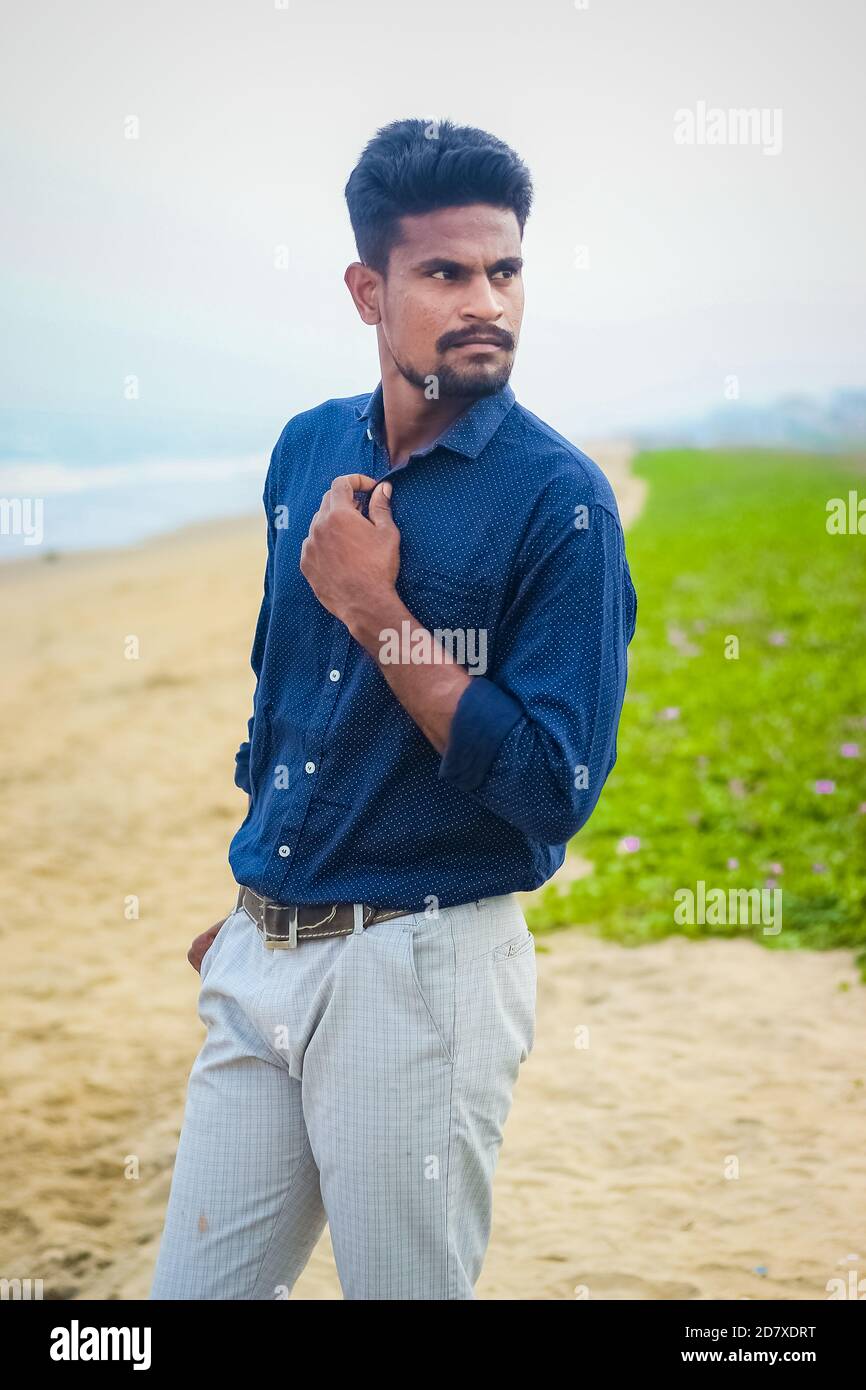 Sexy Indian model posing with wearing formal shirt & pant in sea beach view. Handsome and confident men. Outdoor portrait of smiling young Asian india Stock Photo - Alamy Sexy Indian model posing with wearing formal shirt & pant in sea beach view. Handsome and confident men. Outdoor portrait of smiling young Asian india Stock Photo - Alamy