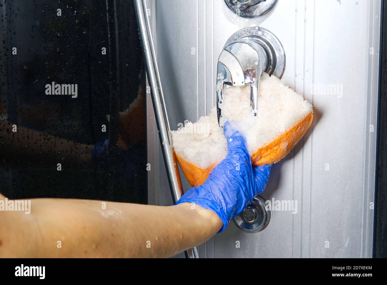 Cleaning of shower steam cabins from calcium deposits. Cleaning in the