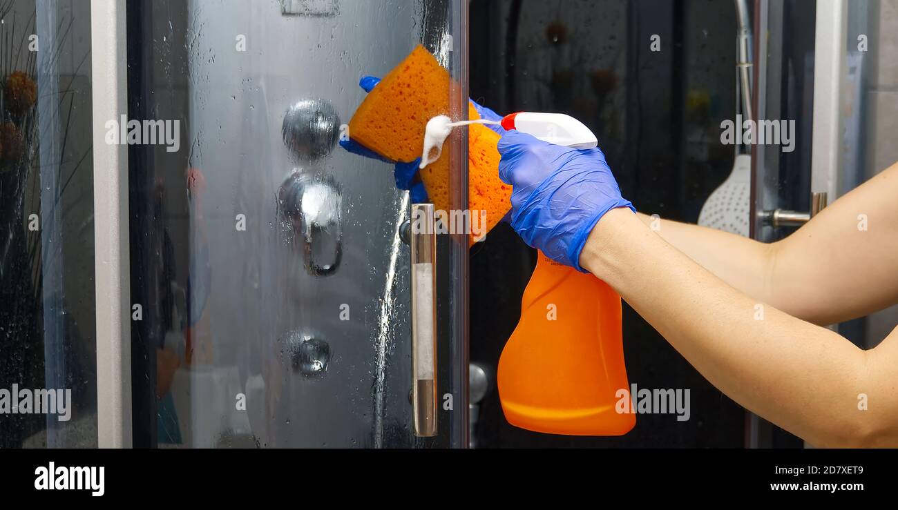 Cleaning of shower steam cabins from calcium deposits. Cleaning in the