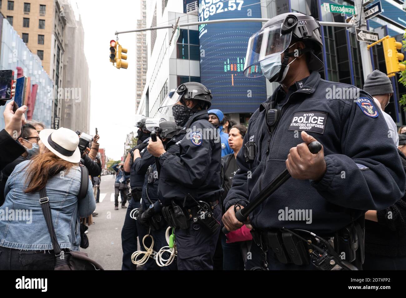 NEW YORK, NY – OCTOBER 25: NYPD Police Officers stand ready in Times ...