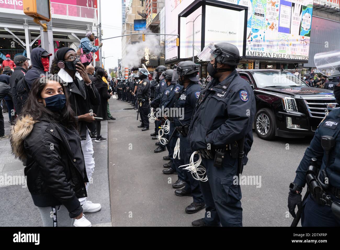 NEW YORK, NY – OCTOBER 25: NYPD Police Officers stand ready in Times ...