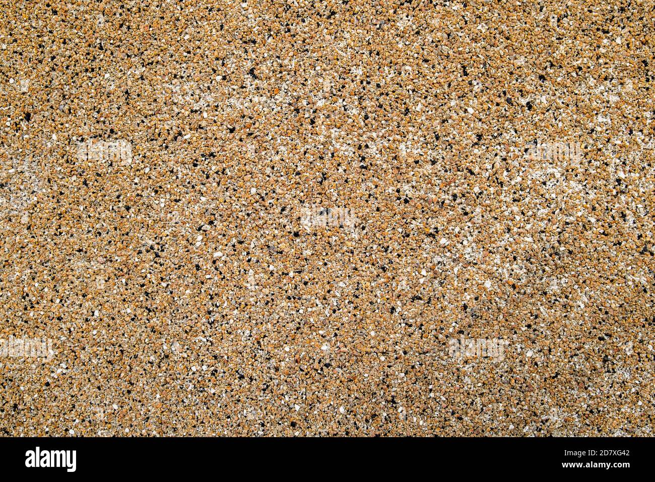 Fine colored granite chips as texture, background, wallpaper Stock