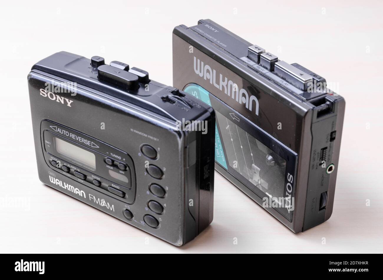 Sony Walkman Cassette Player WM-24, 1984 until 1987, compact audio music,  on wooden desk or table, flat lay, studio Stock Photo - Alamy