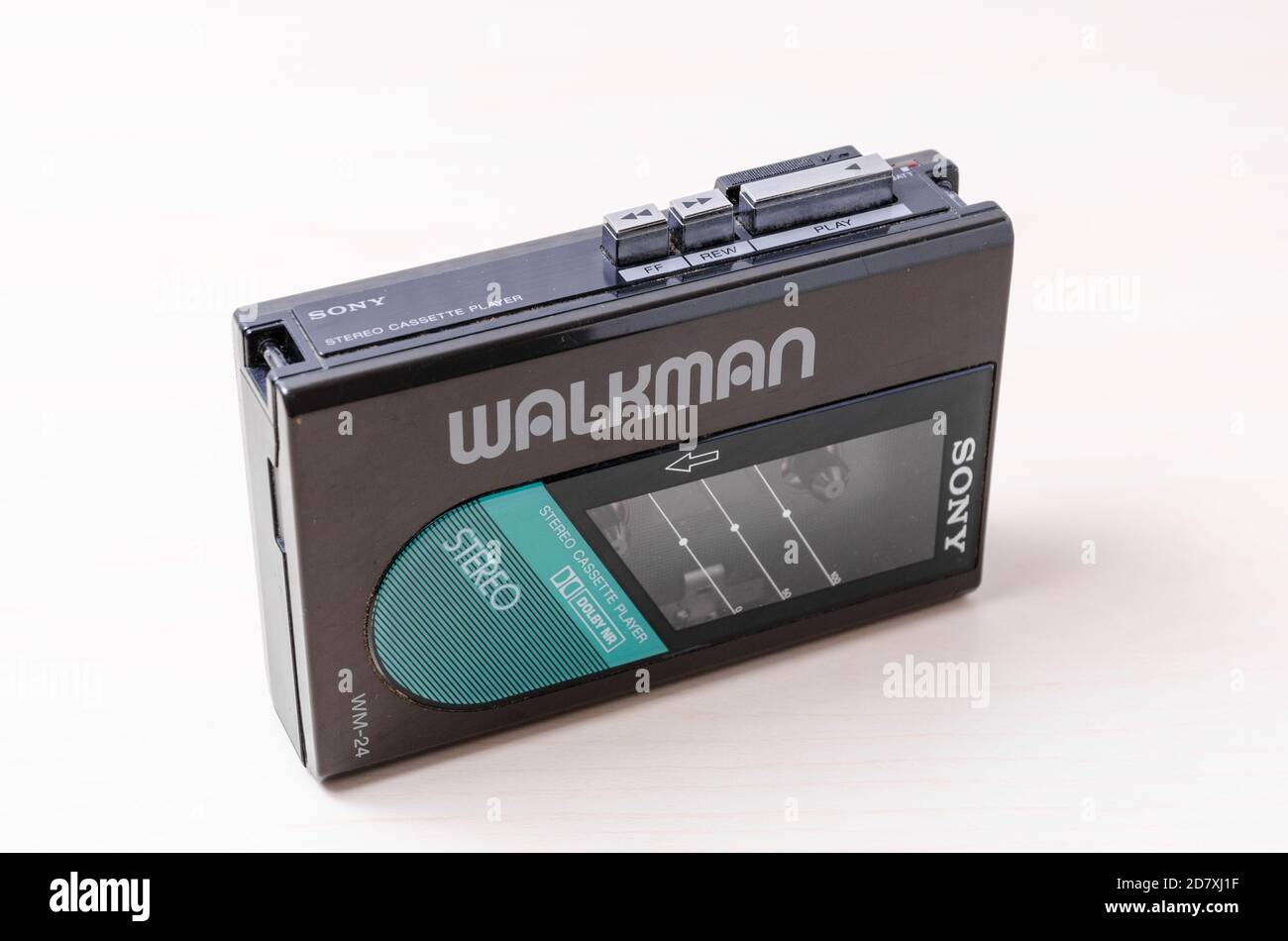 Sony Walkman Cassette Player WM-24, 1984 until 1987, compact audio music, on wooden desk or table, flat lay, studio Stock Photo