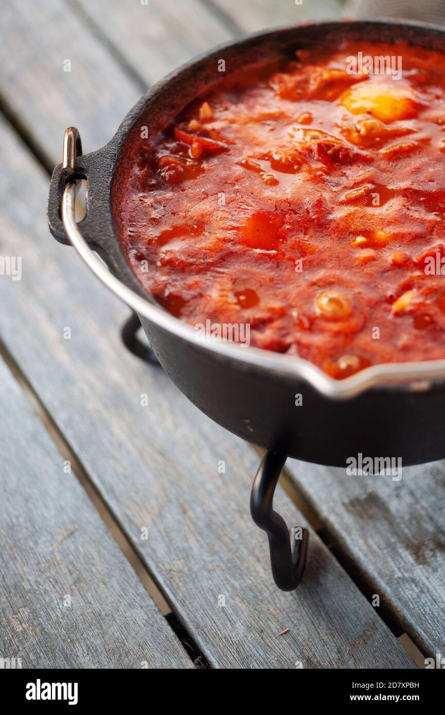 Spicy chorizo,bean,tomato and egg stew Stock Photo Alamy
