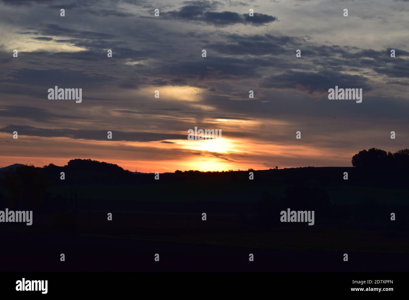 fire-like sunrise in the Eifel Stock Photo