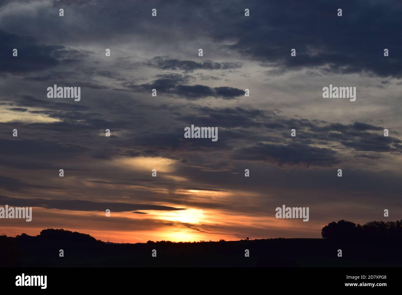 fire-like sunrise in the Eifel Stock Photo
