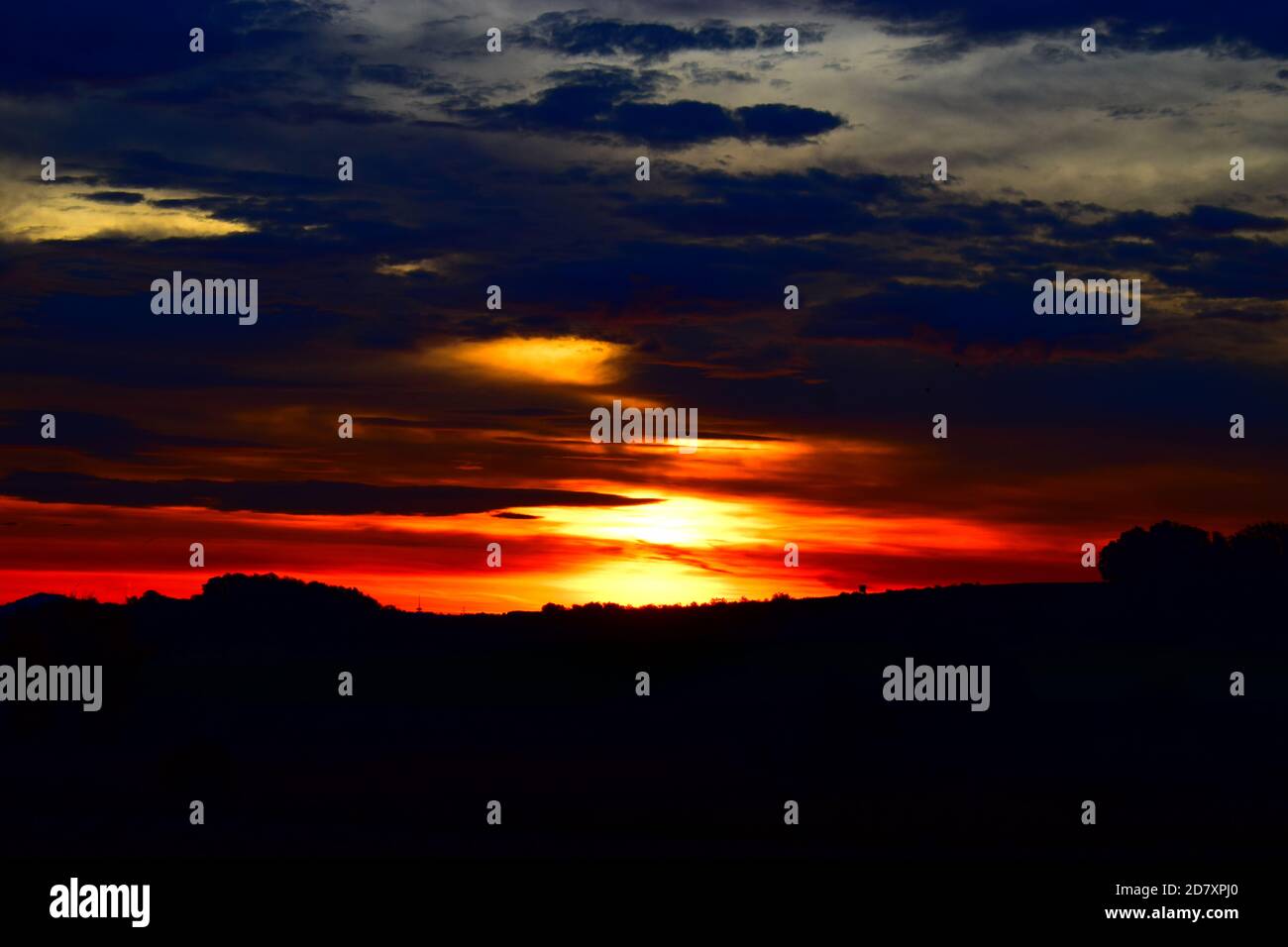 fire-like sunrise in the Eifel Stock Photo