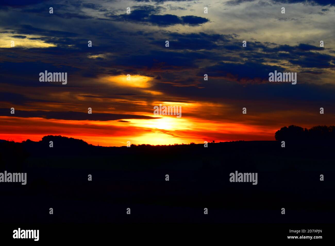 fire-like sunrise in the Eifel Stock Photo