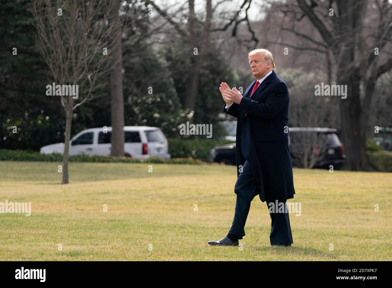 U.S. President Donald Trump walks across the South Lawn of the White House as he boards Marine One in Washington, D.C., U.S.  on Thursday, January, 30, 2020. Credit: Alex Edelman/The Photo Access Stock Photo