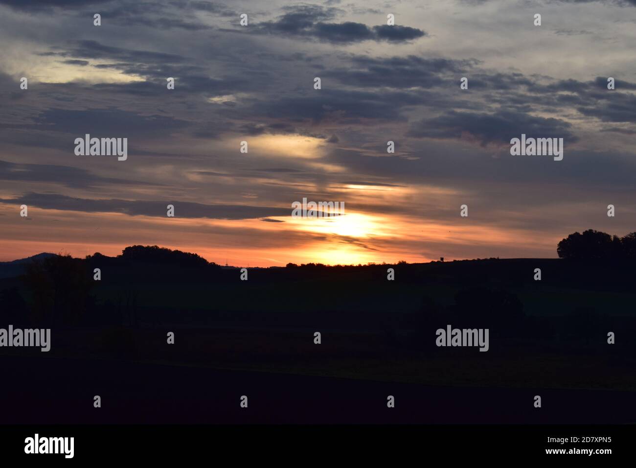 fire-like sunrise in the Eifel Stock Photo