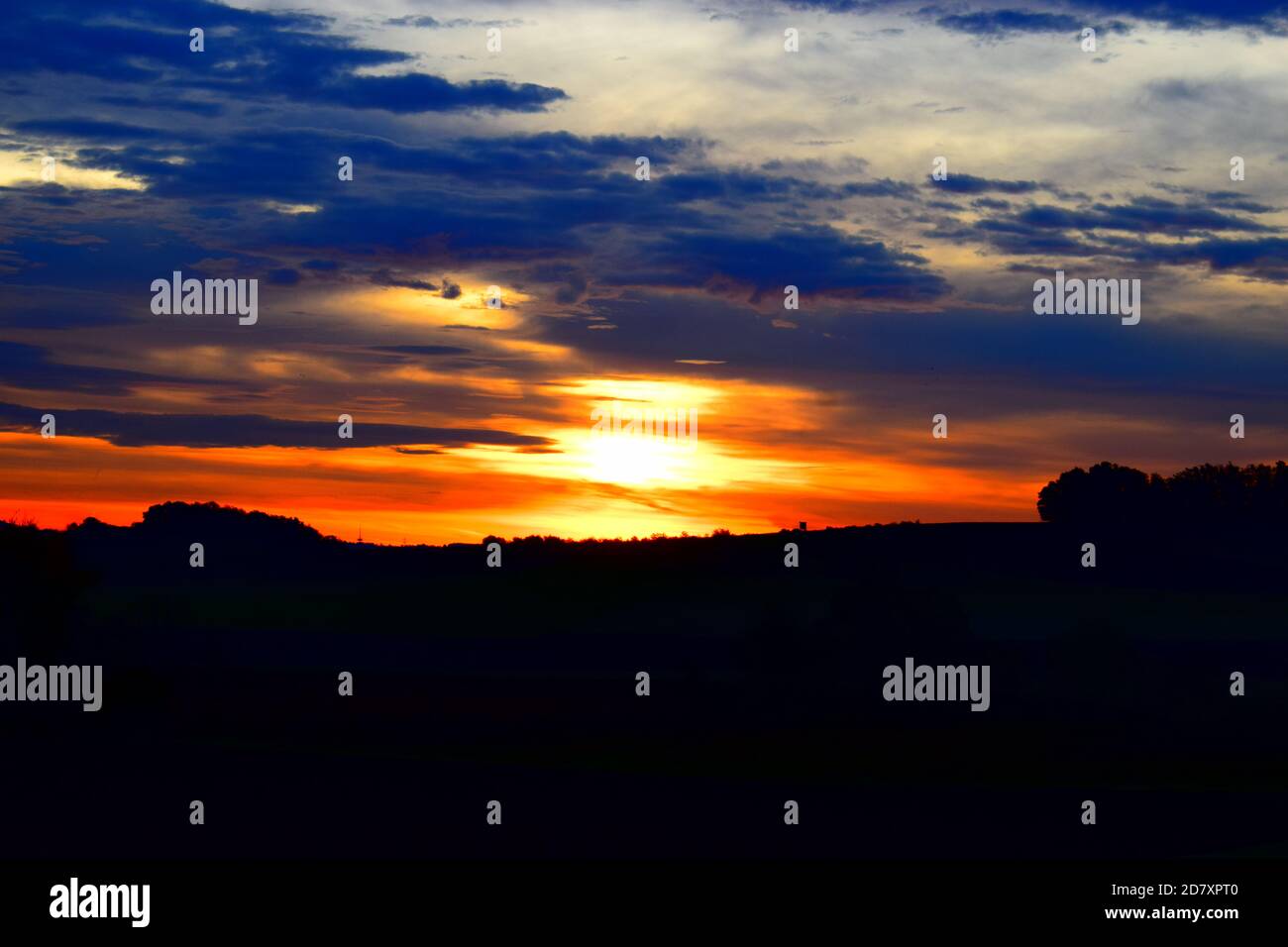 fire-like sunrise in the Eifel Stock Photo