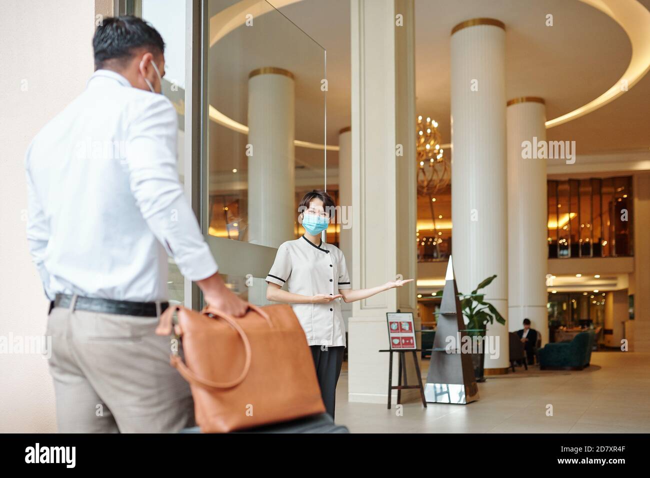 Welcoming guest hi-res stock photography and images - Alamy